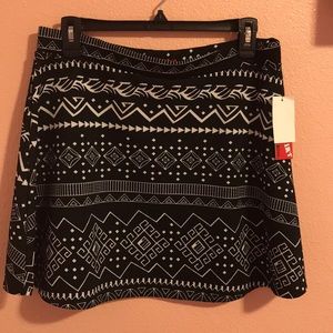 Black and white skirt with different patterns.